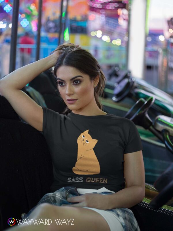 crop-top-tee-mockup-being-worn-by-a-girl-lying-on-the-arcade-car-games-a19440