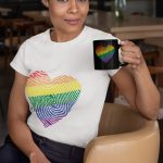 t-shirt-mockup-of-a-woman-sitting-on-a-chair-holding-an-11-oz-coffee-mug-31705